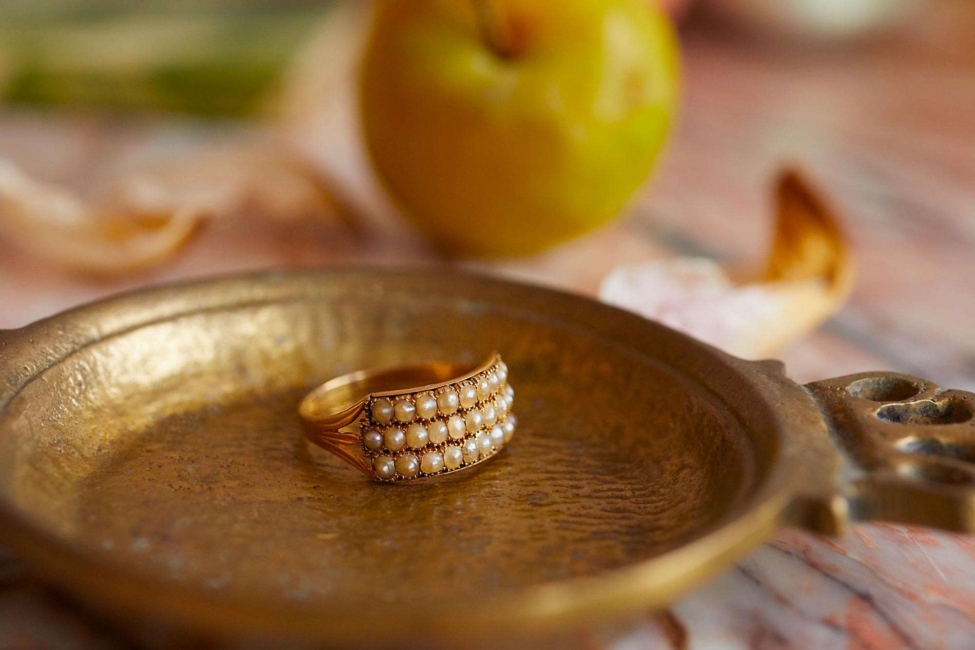 antique pearl ring on a tray