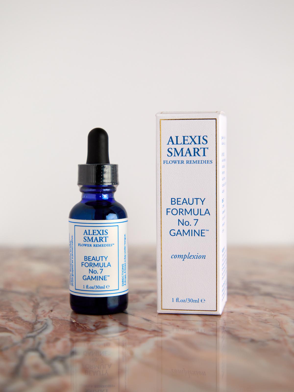 Beauty Formula No 7 Gamine with box on pink marble by Alexis Smart
