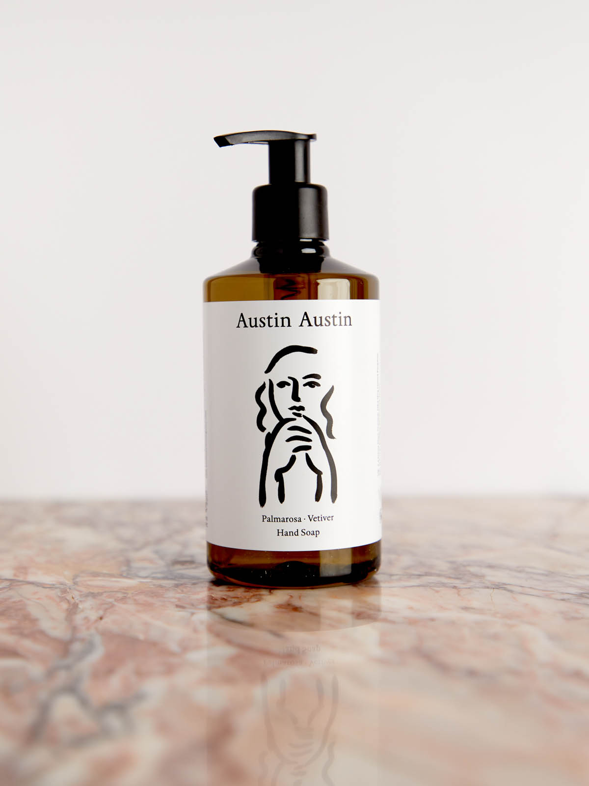 Palmarosa & Vetiver Hand Soap on pink marble by Austin Austin