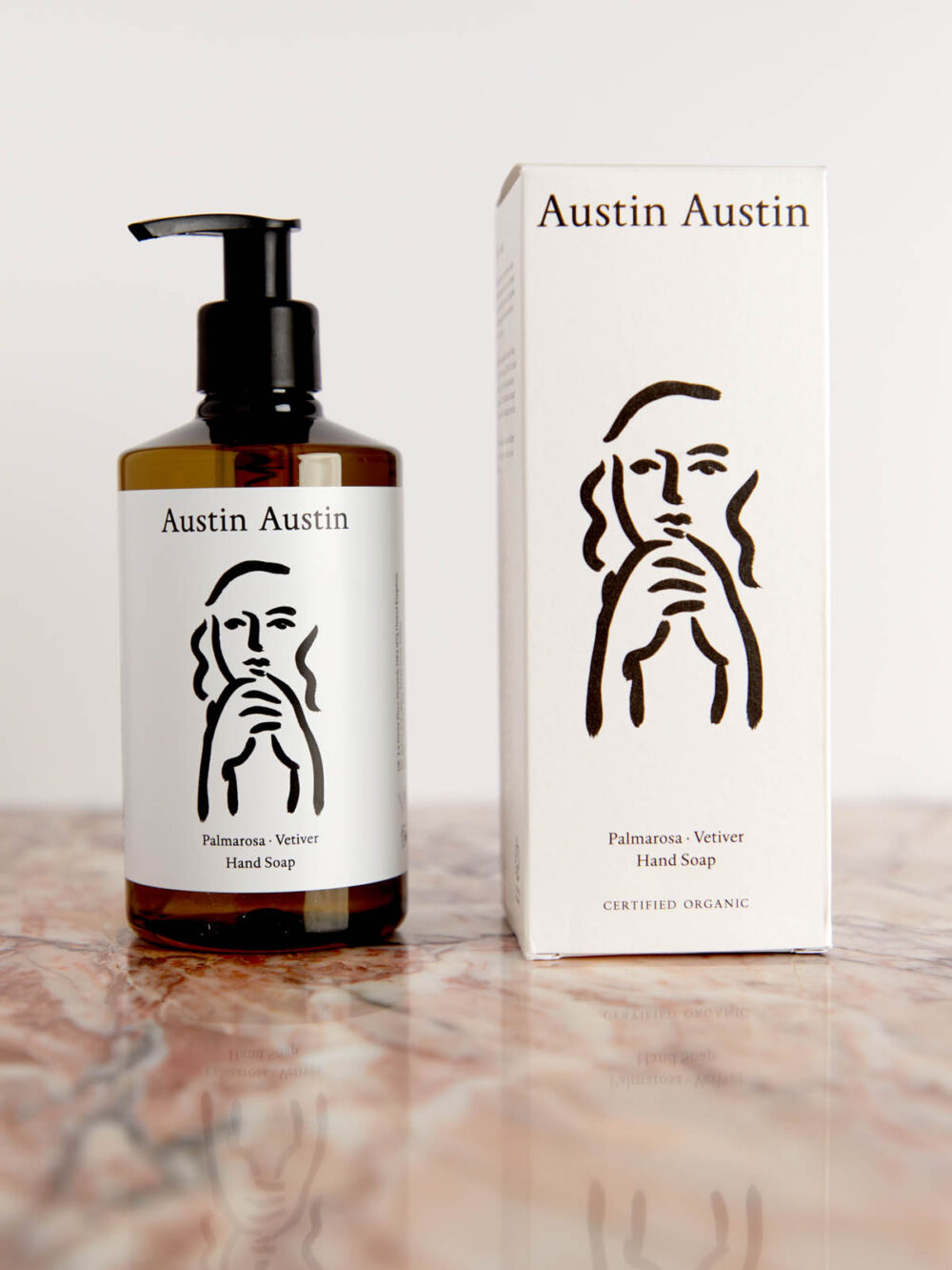 Palmarosa & Vetiver Hand Soap with box on pink marble by Austin Austin
