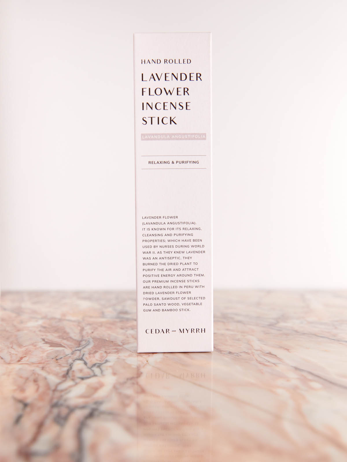 Hand Rolled Lavender Flower Incense Sticks by Cedar & Myrrh box on pink marble