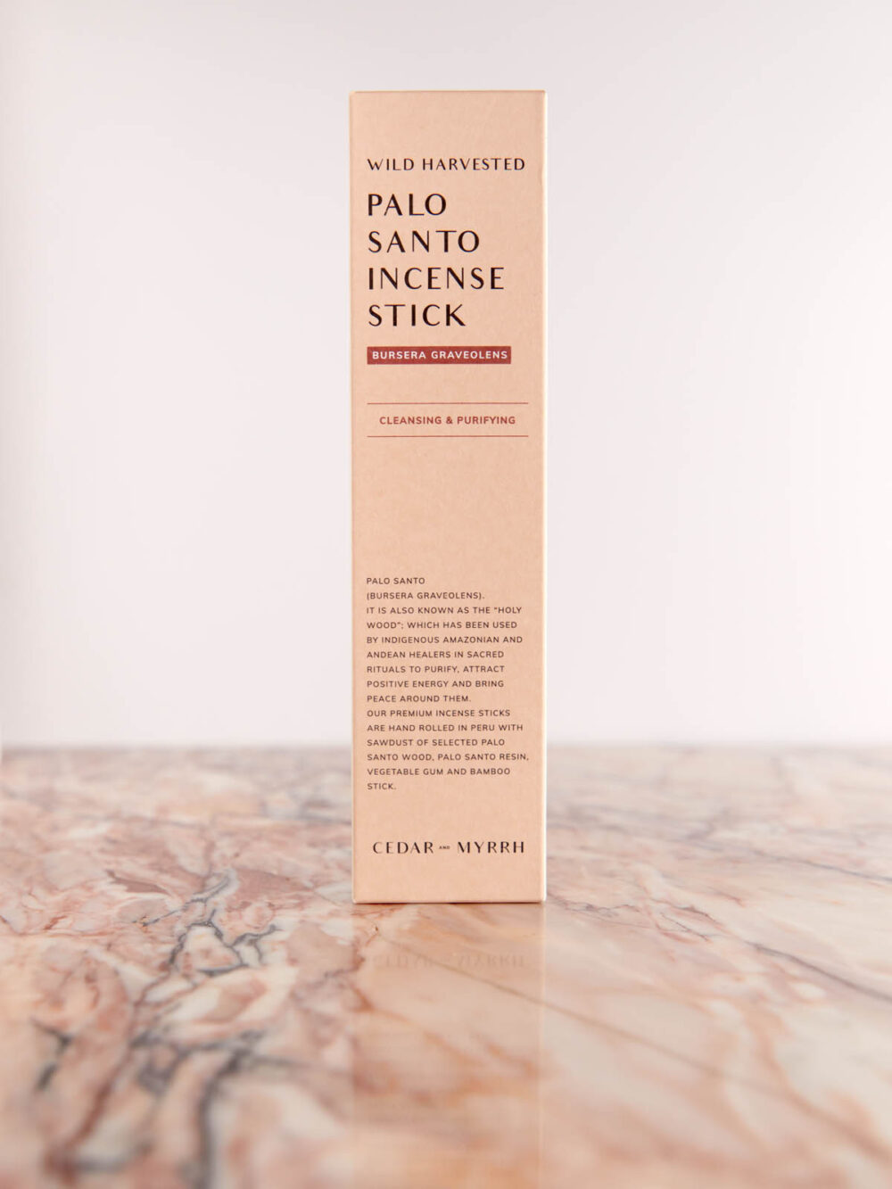 Hand Rolled Palo Santo Incense Sticks by Cedar & Myrrh box on pink marble