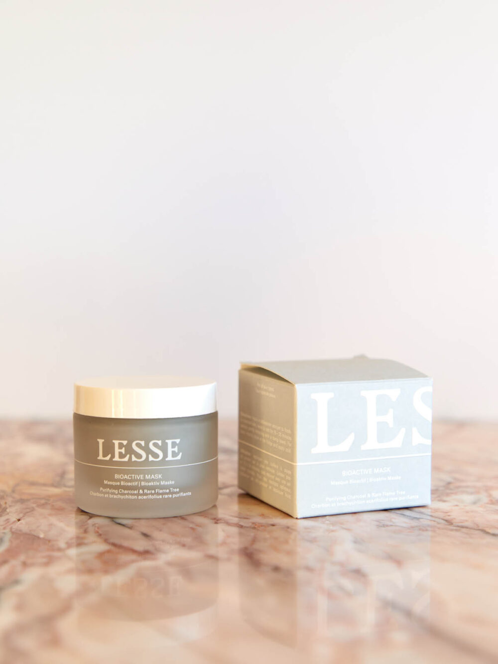 Bioactive Mask by Lesse with box on pink marble