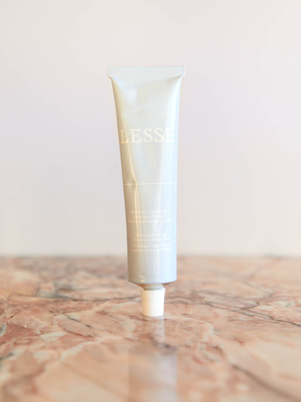 Refining Cleanser by Lesse on pink marble