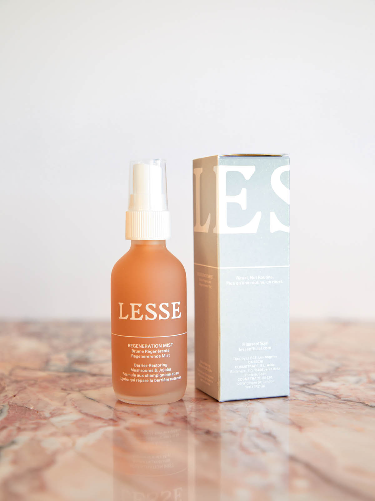 Regeneration Mist with box on pink marble by Lesse