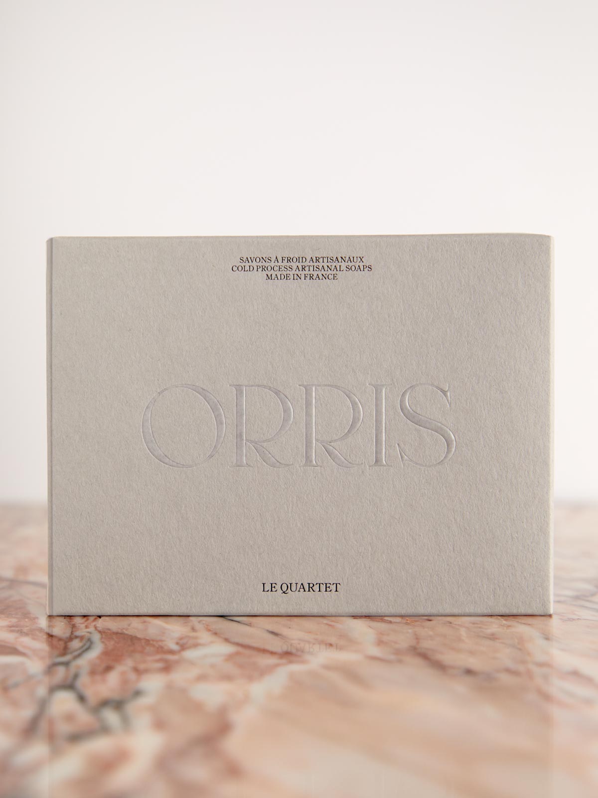 Le Quartet set of soaps by ORRIS box on pink marble