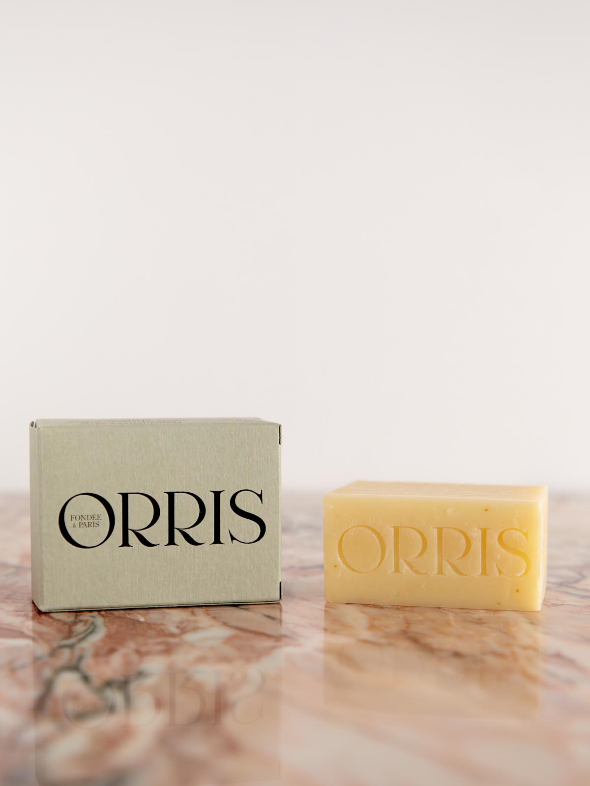 Le Soliste- Cleansing Bar by Orris box and soap on pink marble