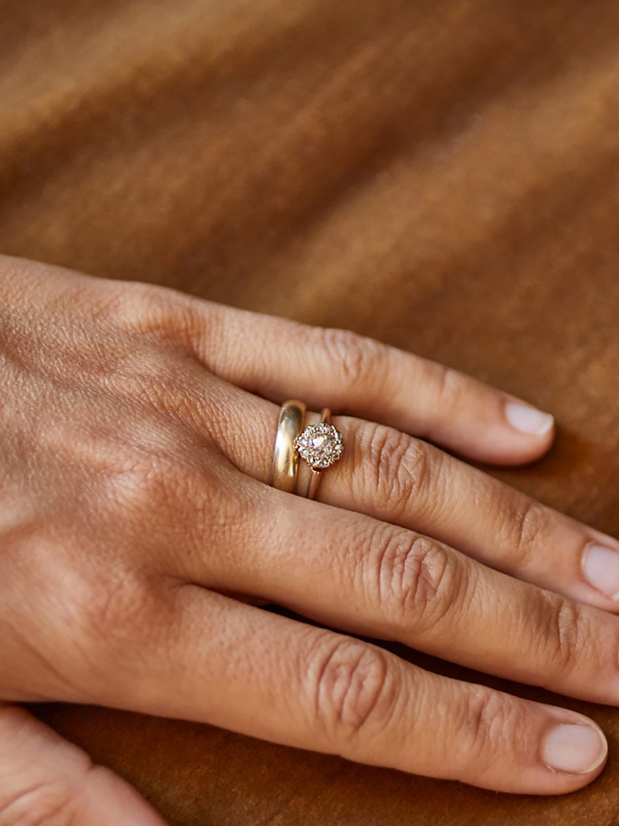 diamond cluster ring on ring finger