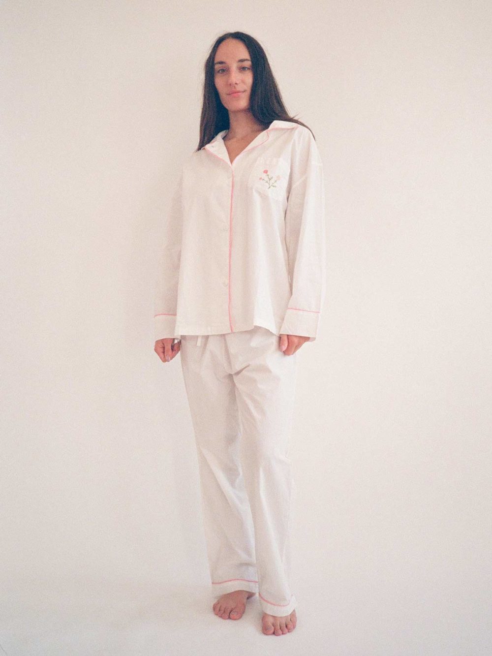 woman wearing domi oversized embroidered pjs