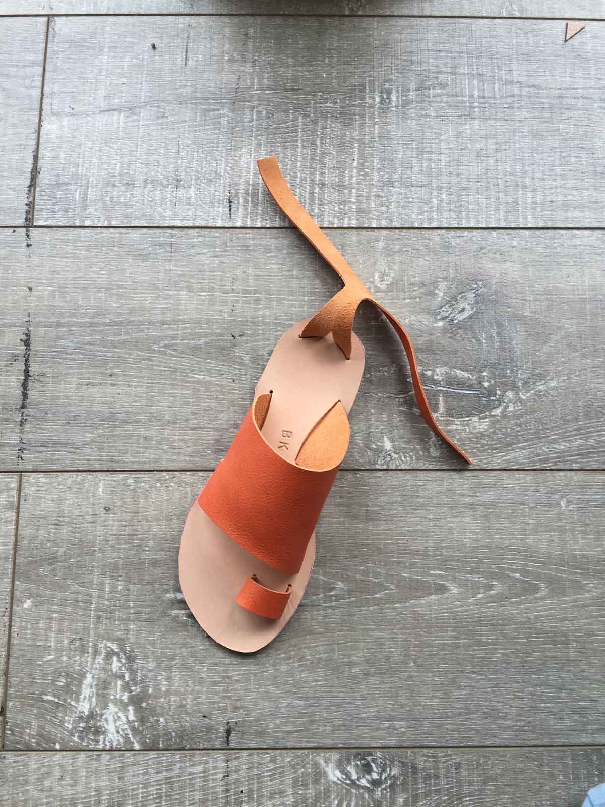 orange handmade sandal from above